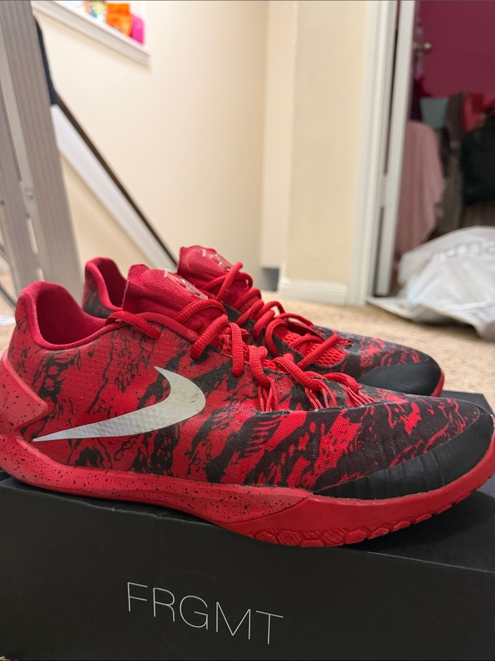 Nike Red and Black Low-Top Sneakers with White Swoosh